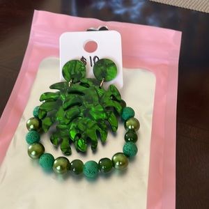 Bracelets with earrings.